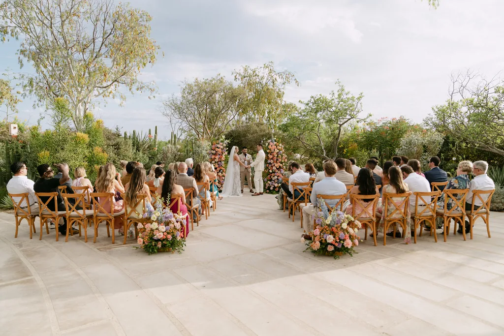 The ceremony at Acre with the guests on both sides of the aisle