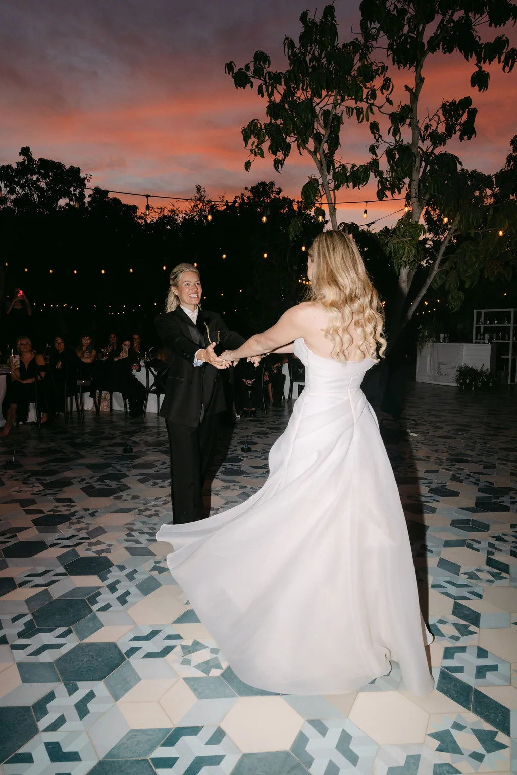 Dancing on the tile while the sky turns magenta