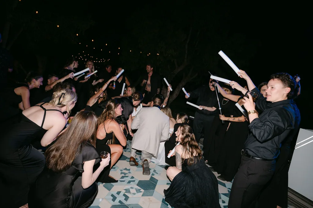 The dance floor at the end of the night, full of glow sticks