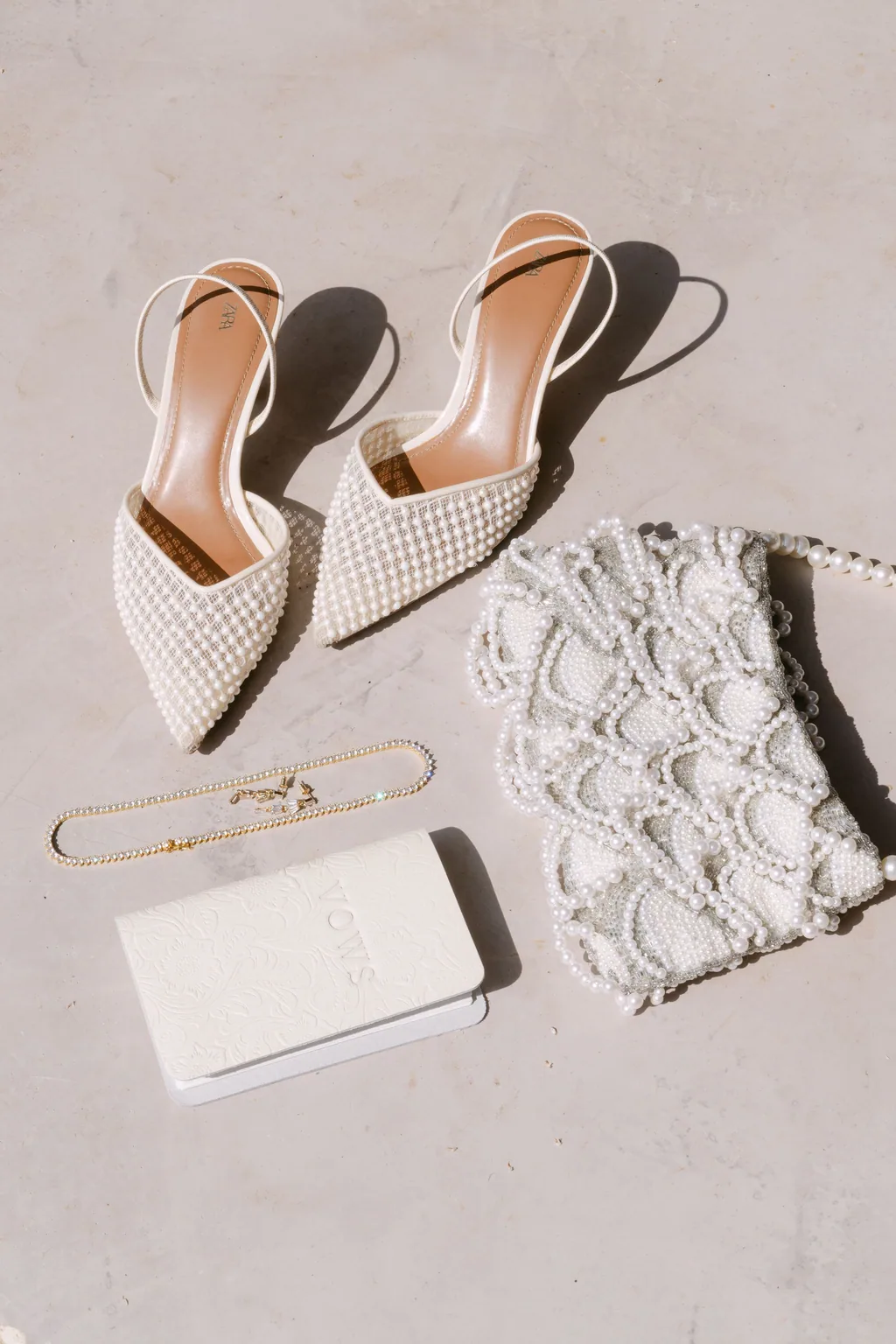 The shoes, the clutch and the beaded bag laid out before getting ready