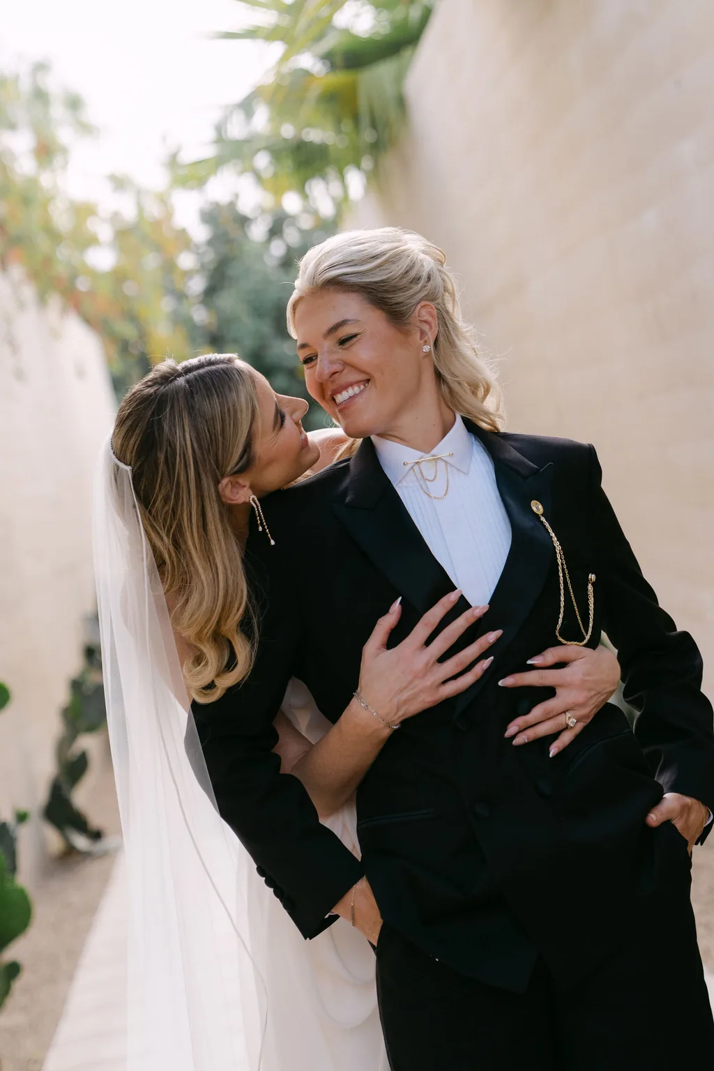 A hand on her chest and the veil between them