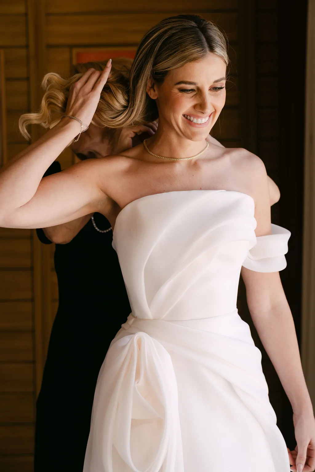 Getting her hair finished before the ceremony