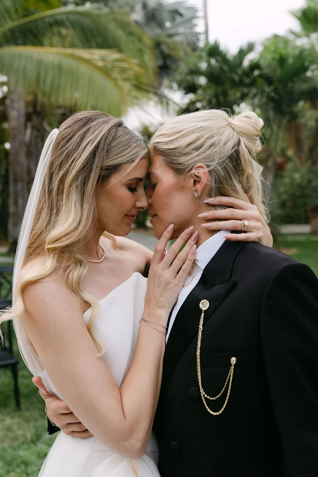 Emma and Whitney with their foreheads together at Acre, San José del Cabo