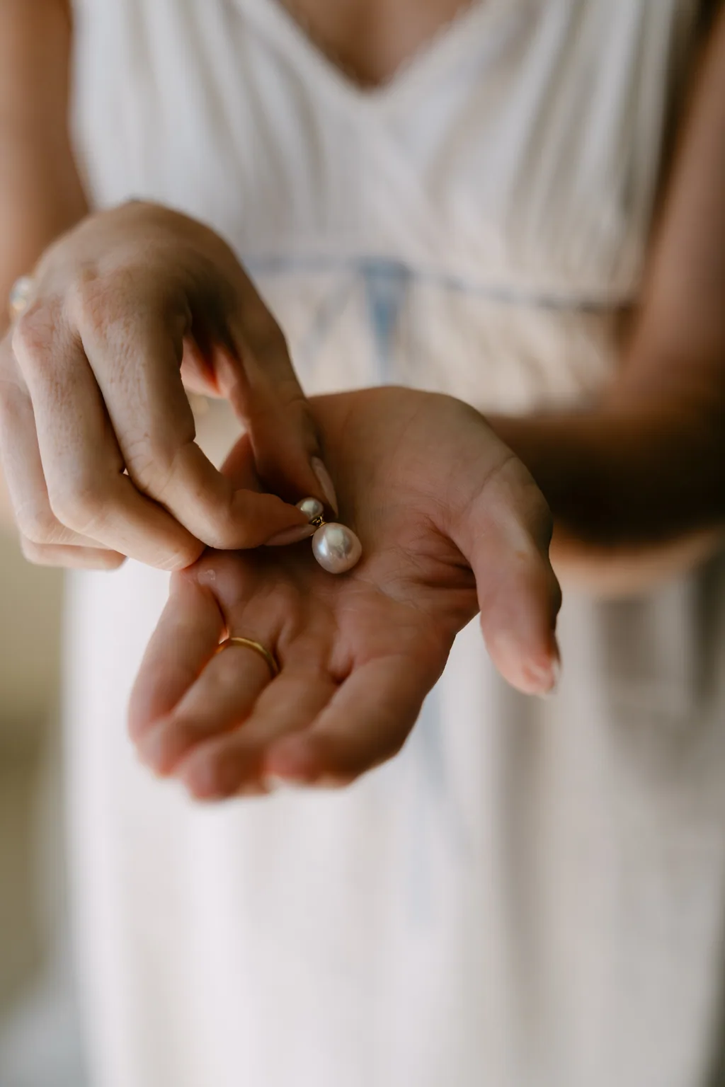 The ring in the palm of her hand