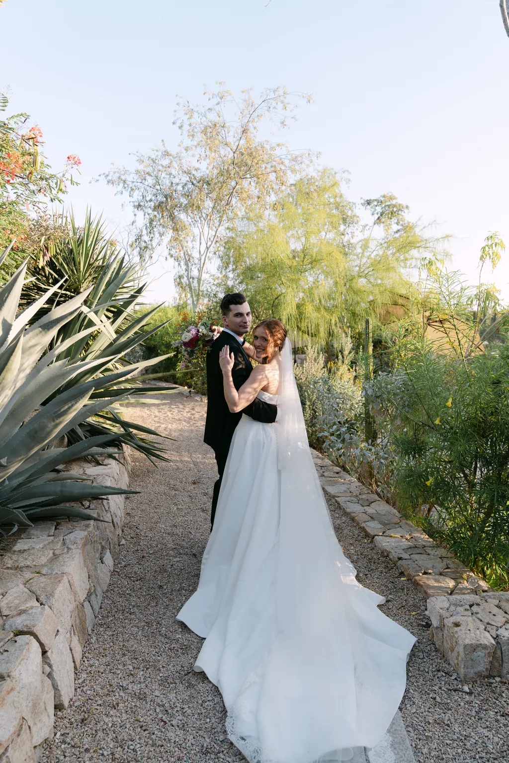 Lauren and Tevyn small in the agave garden at Acre